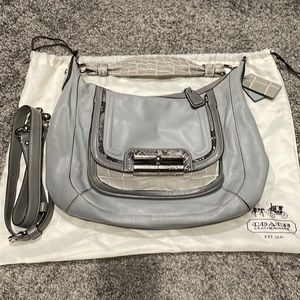 COACH shoulder and crossbody bag in gray leather, blue satin interior.